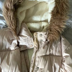 Like new ! Fur hoodie puffer for girls .  Pretty color . Matches with anything.